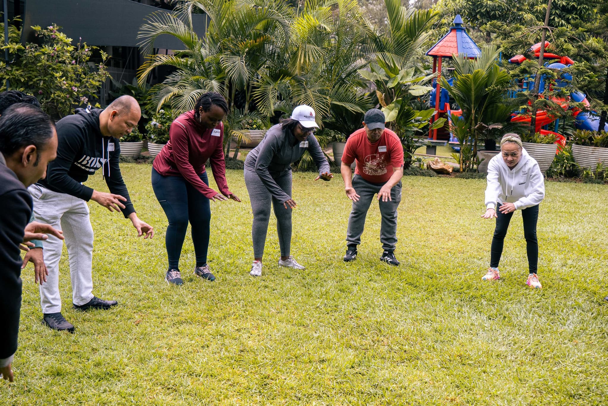 Facilitator leading an outdoor team development session