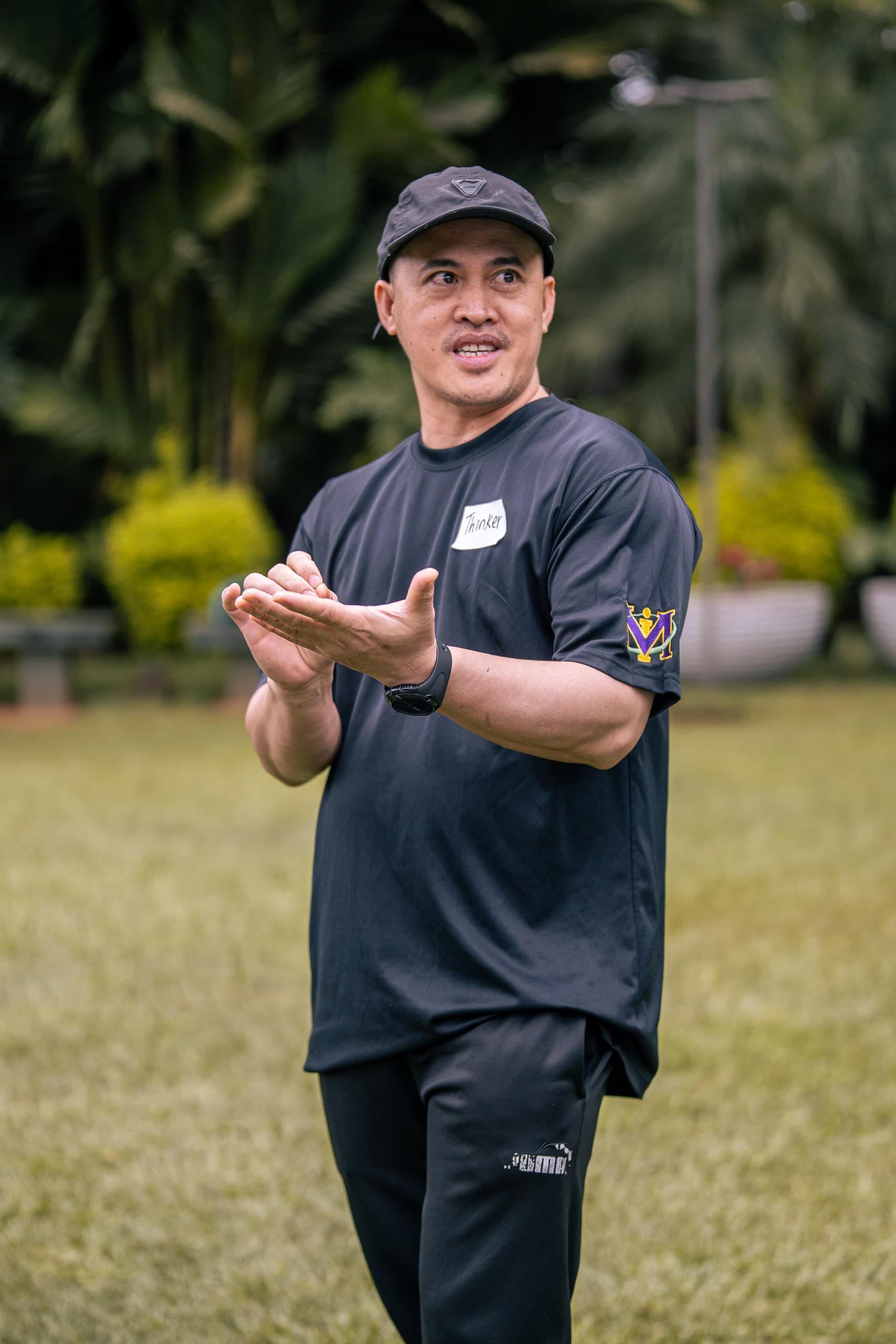 Corporate team members laughing together during a team building activity